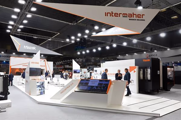 Diseño y montaje de stand ferial para exhibición de maquinaria pesada de Intermaher en BIEMH 2022